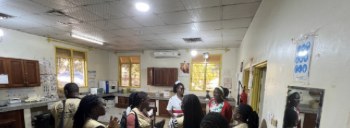 MYCU and Ministry of Health team in the hospital laboratory with laboratory staff